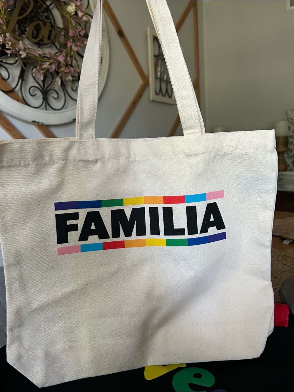 FAMILIA White Canvas Tote with Rainbow Accent. With matching button.